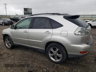 2006 Lexus RX 400h with VIN JTJGW31U660002194, listed as a Copart auction lot 56718845 with 160,858 mi miles and Salvage title. Bid and sale history available at DreamBid. Image 2.