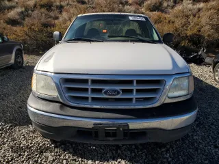 1999 Ford F-150 z VIN 1FTRF18W1XKA87801, wystawiony jako Copart lot #79094454 z przebiegiem Nie podano mil oraz Szkoda całkowita • Salvage title. Historia ofert i sprzedaży dostępna na DreamBid. Obrazek 5.