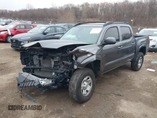 2021 Toyota Tacoma SR z VIN 5TFCZ5AN3MX269374, wystawiony jako IAAI lot #41068356 z przebiegiem 54 358 mil mil oraz . Historia ofert i sprzedaży dostępna na DreamBid. Obrazek 2.