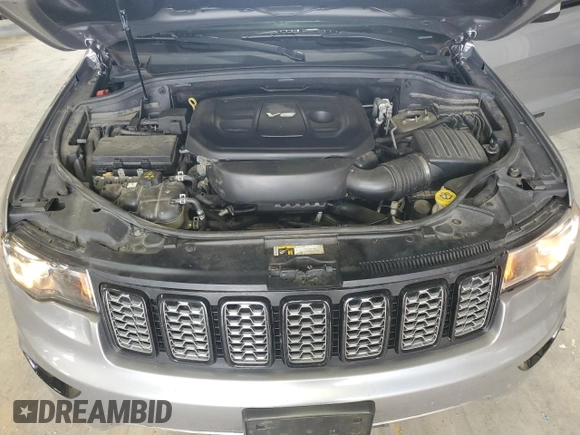 2017 Jeep Grand Cherokee Altitude with VIN 1C4RJFAG9HC772705, listed as a Copart auction lot 61562925 with 184,004 mi miles and Salvage title. Bid and sale history available at DreamBid. Image 12.