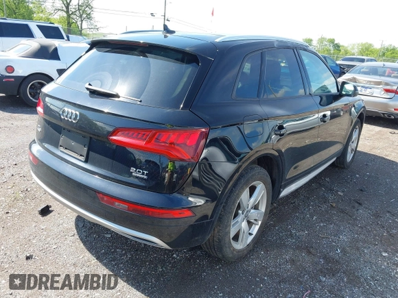 2018 Audi Q5 Premium with VIN WA1ANAFY1J2003708, listed as a IAAI auction lot 42116637 with 60,813 mi miles and . Bid and sale history available at DreamBid. Image 4.