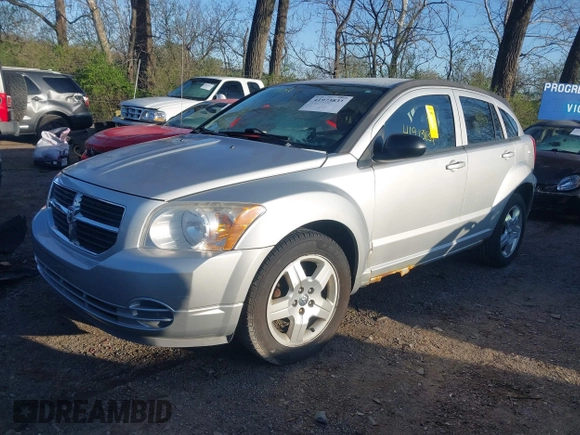 2009 Dodge Caliber SXT z VIN 1B3HB48A79D103215, wystawiony jako IAAI lot #41973831 z przebiegiem 134 797 mil mil oraz . Historia ofert i sprzedaży dostępna na DreamBid. Obrazek 2.