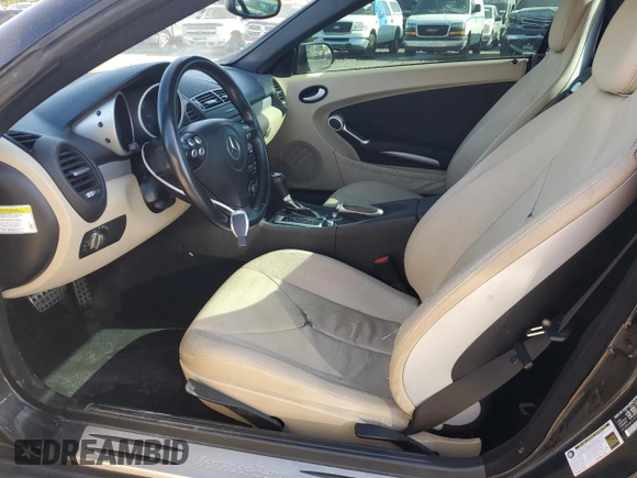 2006 Mercedes-Benz SLK-Class 3.0L with VIN WDBWK54F66F114895, listed as a Copart auction lot 55417885 with 128,984 mi miles and Salvage Title. Bid and sale history available at carsss.com. Image 7.