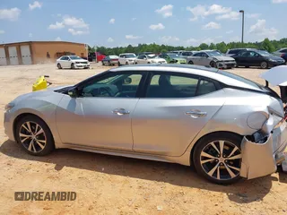 2016 Nissan Maxima SR with VIN 1N4AA6AP7GC389606, listed as a IAAI auction lot 42451614 with 114,957 mi miles and . Bid and sale history available at DreamBid. Image 14.