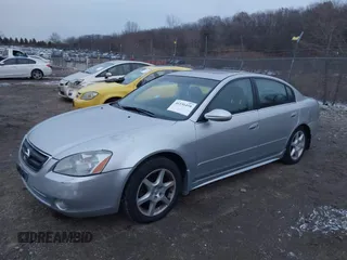 2003 Nissan Altima SE z VIN 1N4BL11E33C302441, wystawiony jako IAAI lot #41156458 z przebiegiem 123 796 mil mil oraz . Historia ofert i sprzedaży dostępna na DreamBid. Obrazek 2.