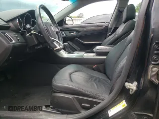 2010 Cadillac CTS with VIN 1G6DA5EG3A0143790, listed as a Copart auction lot 55040923 with 154,130 mi miles and Salvage Title. Bid and sale history available at DreamBid. Image 7.