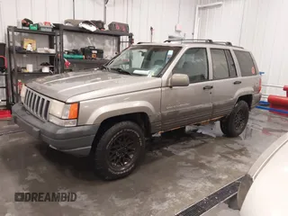 1998 Jeep Grand Cherokee Laredo with VIN 1J4GZ58S3WC343555, listed as a IAAI auction lot 41528943 with 219,146 mi miles. Bid and sale history available at carsss.com. Image 18.