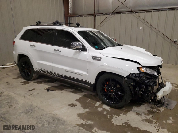 2014 Jeep Grand Cherokee Summit with VIN 1C4RJFJT7EC106290, listed as a Copart auction lot 52001295 with 137,266 mi miles and Non Repairable. Bid and sale history available at carsss.com. Image 4.
