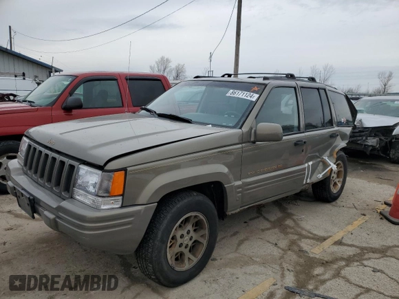 1997 Jeep Grand Cherokee Limited with VIN 1J4GZ78Y3VC568413, listed as a Copart auction lot 86171124 with 104,558 mi miles and Salvage Title. Bid and sale history available at carsss.com. Image 1.