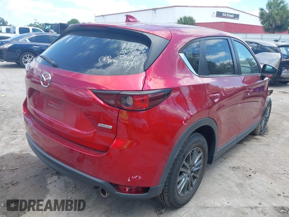 2019 Mazda CX-5 Touring with VIN JM3KFACM6K1549234, listed as a IAAI auction lot 42036633 with 85,065 mi miles and . Bid and sale history available at carsss.com. Image 4.