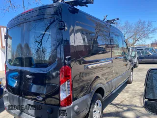 2015 Ford Transit Cargo with VIN 1FTNR2CMLFKA14542, listed as a Copart auction lot 52863735 with 134,970 mi miles and Clean title. Bid and sale history available at DreamBid. Image 4.