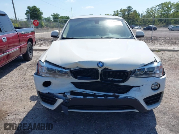 2015 BMW X4 xDrive28i with VIN 5UXXW3C59F0M88331, listed as a IAAI auction lot 42093953 with 138,205 mi miles and . Bid and sale history available at DreamBid. Image 12.