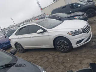 2020 Volkswagen Jetta S z VIN 3VWCB7BU5LM018170, wystawiony jako IAAI lot #41915030 z przebiegiem 83 566 mil mil oraz . Historia ofert i sprzedaży dostępna na DreamBid. Obrazek 13.