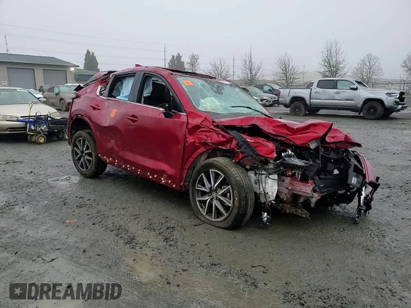 2018 Mazda CX-5 Grand Touring with VIN JM3KFBDM2J0432713, listed as a Copart auction lot 88693565 with 0 mi miles and Salvage Title. Bid and sale history available at carsss.com. Image 12.