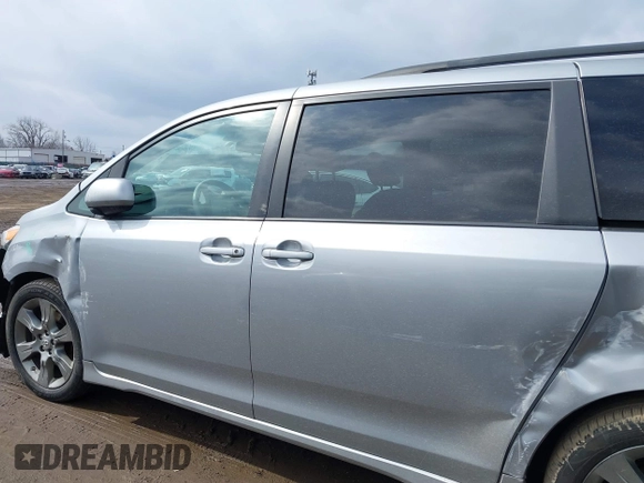 2011 Toyota Sienna SE with VIN 5TDXK3DC1BS096963, listed as a IAAI auction lot 41676328 with 168,436 mi miles. Bid and sale history available at carsss.com. Image 14.