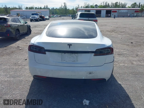 2020 Tesla Model S Long Range with VIN 5YJSA1E2XLF360260, listed as a IAAI auction lot 41241778 with 141,594 mi miles. Bid and sale history available at carsss.com. Image 16.