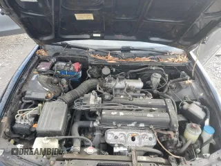 1999 Acura Integra LS with VIN JH4DC4451XS014086, listed as a Copart auction lot 83095464 with 106,452 mi miles and Salvage Title. Bid and sale history available at DreamBid. Image 11.
