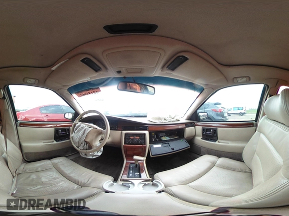 1994 Cadillac Seville STS z VIN 1G6KY5296RU823387, wystawiony jako IAAI lot #42151901 z przebiegiem 165 918 mil mil oraz . Historia ofert i sprzedaży dostępna na DreamBid. Obrazek 19.