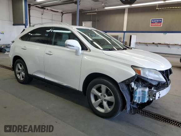 2010 Lexus RX 350 with VIN 2T2BK1BA3AC002553, listed as a Copart auction lot 56052635 with 219,138 mi miles and Salvage Title. Bid and sale history available at DreamBid. Image 4.