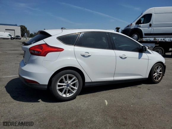 2017 Ford Focus SE with VIN 1FADP3K26HL223348, listed as a Copart auction lot 54056455 with 65,700 mi miles and Salvage Title. Bid and sale history available at carsss.com. Image 3.