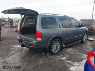 2015 Nissan Armada SV with VIN 5N1BA0ND5FN601574, listed as a IAAI auction lot 41240197 with 180,008 mi miles. Bid and sale history available at carsss.com. Image 4.