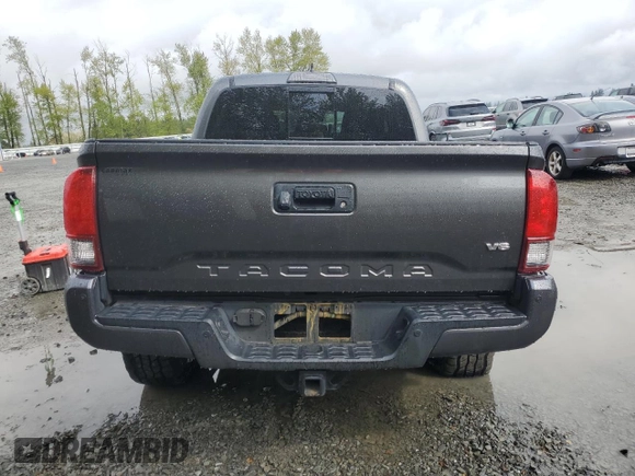 2019 Toyota Tacoma SR with VIN 3TMCZ5AN7KM237563, listed as a Copart auction lot 53919355 with 65,392 mi miles and Salvage title. Bid and sale history available at DreamBid. Image 6.