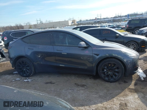 2022 Tesla Model Y Long Range z VIN 7SAYGDEE6NA013757, wystawiony jako IAAI lot #41364867 z przebiegiem 33 621 mil mil oraz . Historia ofert i sprzedaży dostępna na DreamBid. Obrazek 14.