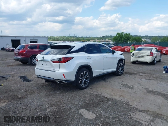 2019 Lexus RX 350 with VIN 2T2BZMCAXKC195457, listed as a IAAI auction lot 42203295 with 31,811 mi miles and . Bid and sale history available at DreamBid. Image 4.