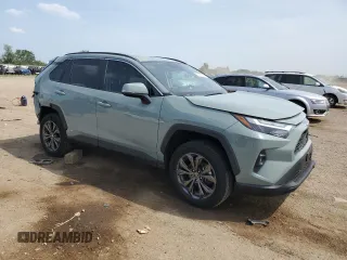 2022 Toyota RAV4 Hybrid XLE Premium with VIN 4T3B6RFV8NU101319, listed as a Copart auction lot 60987535 with 100,070 mi miles and Salvage title. Bid and sale history available at DreamBid. Image 4.