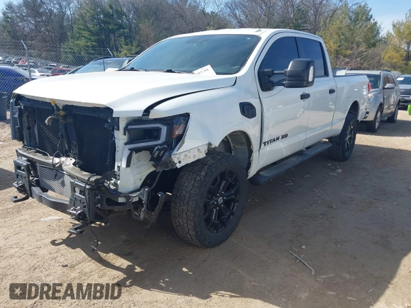 2018 Nissan Titan XD SV with VIN 1N6BA1F40JN523851, listed as a IAAI auction lot 41800730 with 104,527 mi miles. Bid and sale history available at carsss.com. Image 20.