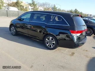 2015 Honda Odyssey Touring Elite with VIN 5FNRL5H93FB065594, listed as a IAAI auction lot 41826693 with 94,632 mi miles. Bid and sale history available at carsss.com. Image 3.
