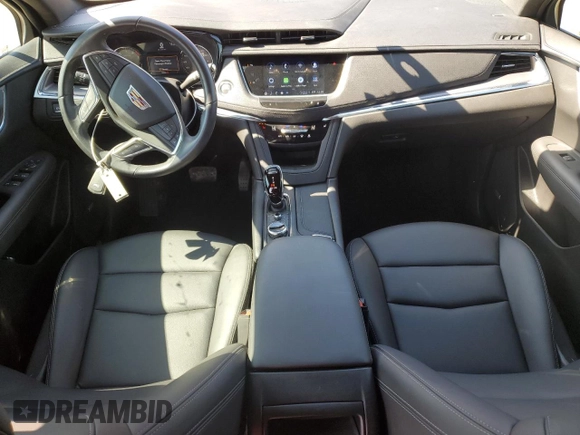 2023 Cadillac XT5 FWD Luxury z VIN 1GYKNAR45PZ191436, wystawiony jako Copart lot #45653615 z przebiegiem 15 044 mil mil oraz Szkoda całkowita • Salvage title. Historia ofert i sprzedaży dostępna na DreamBid. Obrazek 8.