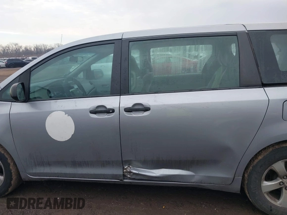 2012 Toyota Sienna with VIN 5TDZK3DC2CS221981, listed as a IAAI auction lot 41650273 with 146,652 mi miles. Bid and sale history available at carsss.com. Image 14.