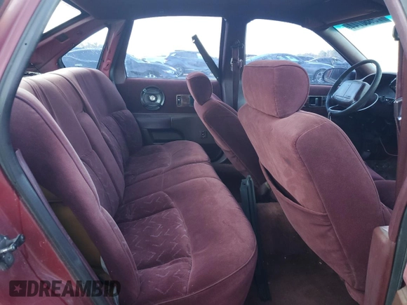 1995 Chevrolet Caprice z VIN 1G1BL52W6SR124943, wystawiony jako Copart lot #75550744 z przebiegiem Nie podano mil oraz Szkoda całkowita • Salvage title. Historia ofert i sprzedaży dostępna na DreamBid. Obrazek 10.