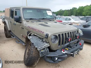 2020 Jeep Gladiator Rubicon z VIN 1C6JJTBG6LL179541, wystawiony jako IAAI lot #42050510 z przebiegiem 52 784 mil mil oraz . Historia ofert i sprzedaży dostępna na DreamBid. Obrazek 1.