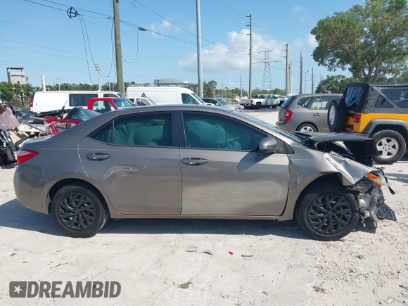 2019 Toyota Corolla L with VIN 5YFBURHE7KP878972, listed as a IAAI auction lot 42000888 with 201,612 mi miles. Bid and sale history available at carsss.com. Image 13.