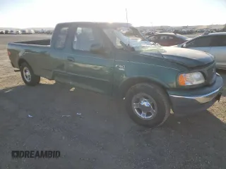 2000 Ford F-150 XL with VIN 1FTRX17W4YNB17453, listed as a Copart auction lot 52051215 with Not provided miles and Salvage title. Bid and sale history available at DreamBid. Image 4.