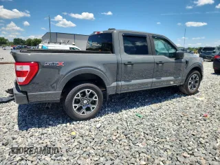 2021 Ford F-150 XL with VIN 1FTEW1CP1MFB85228, listed as a Copart auction lot 61338555 with Not provided miles and Salvage title. Bid and sale history available at DreamBid. Image 3.