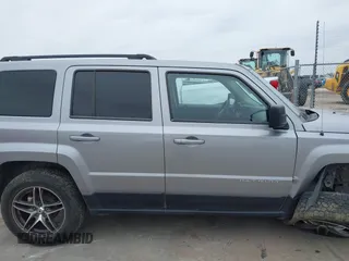 2015 Jeep Patriot Sport with VIN 1C4NJPBB3FD428835, listed as a IAAI auction lot 41637485 with 139,866 mi miles. Bid and sale history available at carsss.com. Image 13.