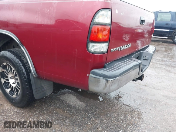 2002 Toyota Tundra SR5 with VIN 5TBRN34112S231284, listed as a IAAI auction lot 41886121 with 364,985 mi miles and . Bid and sale history available at DreamBid. Image 13.