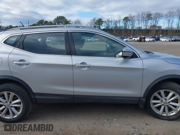 2017 Nissan Rogue SL z VIN JN1BJ1CR7HW141374, wystawiony jako IAAI lot #42017382 z przebiegiem 197 956 mil mil oraz . Historia ofert i sprzedaży dostępna na DreamBid. Obrazek 13.