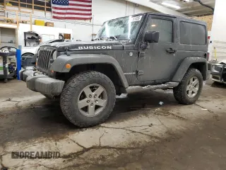 2012 Jeep Wrangler Rubicon with VIN 1C4BJWCG8CL136381, listed as a Copart auction lot 89181035 with 66,928 mi miles and Salvage Title. Bid and sale history available at DreamBid. Image 1.