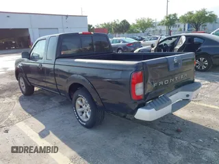 2003 Nissan Frontier XE with VIN 1N6DD26T33C462698, listed as a IAAI auction lot 41854779 with 128,709 mi miles and . Bid and sale history available at DreamBid. Image 3.