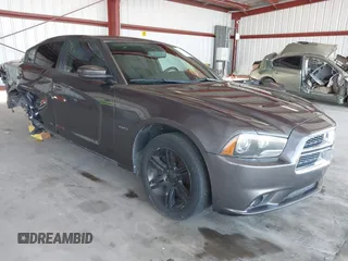 2013 Dodge Charger RT with VIN 2C3CDXCT0DH745384, listed as a IAAI auction lot 42044343 with 147,100 mi miles. Bid and sale history available at carsss.com. Image 1.