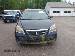 2005 Honda Odyssey EX-L with VIN 5FNRL38725B001662, listed as a IAAI auction lot 42693301 with 161,114 mi miles and . Bid and sale history available at DreamBid. Image 13.
