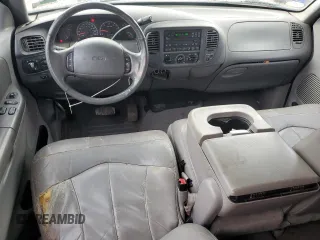 2000 Ford F-150 XL with VIN 1FTRX17L7YNC24292, listed as a Copart auction lot 58852925 with 213,318 mi miles and Salvage title. Bid and sale history available at DreamBid. Image 8.