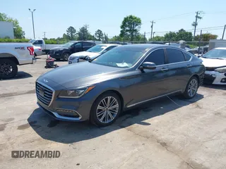 2018 Genesis G80 3.8L z VIN KMHGN4JE1JU253478, wystawiony jako IAAI lot #42066296 z przebiegiem 84 226 mil mil oraz . Historia ofert i sprzedaży dostępna na DreamBid. Obrazek 2.