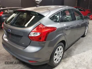 2012 Ford Focus SE with VIN 1FAHP3K22CL394088, listed as a IAAI auction lot 40953085 with 147,259 mi miles and . Bid and sale history available at carsss.com. Image 4.