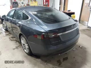 2014 Tesla Model S 60 with VIN 5YJSA1H16EFP52853, listed as a IAAI auction lot 41941989 with 132,038 mi miles and . Bid and sale history available at DreamBid. Image 3.