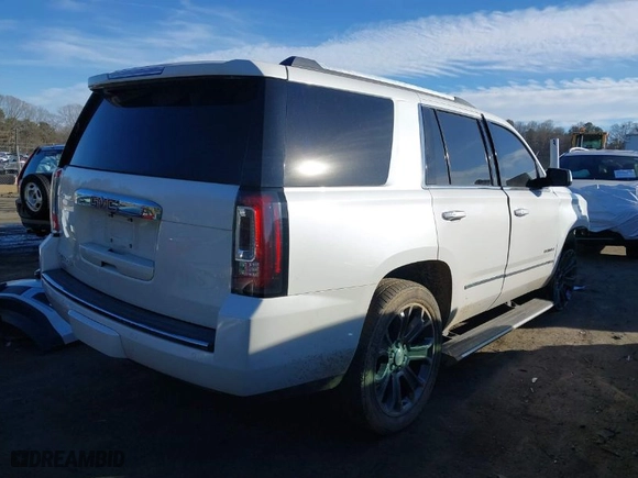2016 GMC Yukon Denali with VIN 1GKS2CKJ1GR363542, listed as a IAAI auction lot 41435129 with 180,289 mi miles. Bid and sale history available at carsss.com. Image 4.